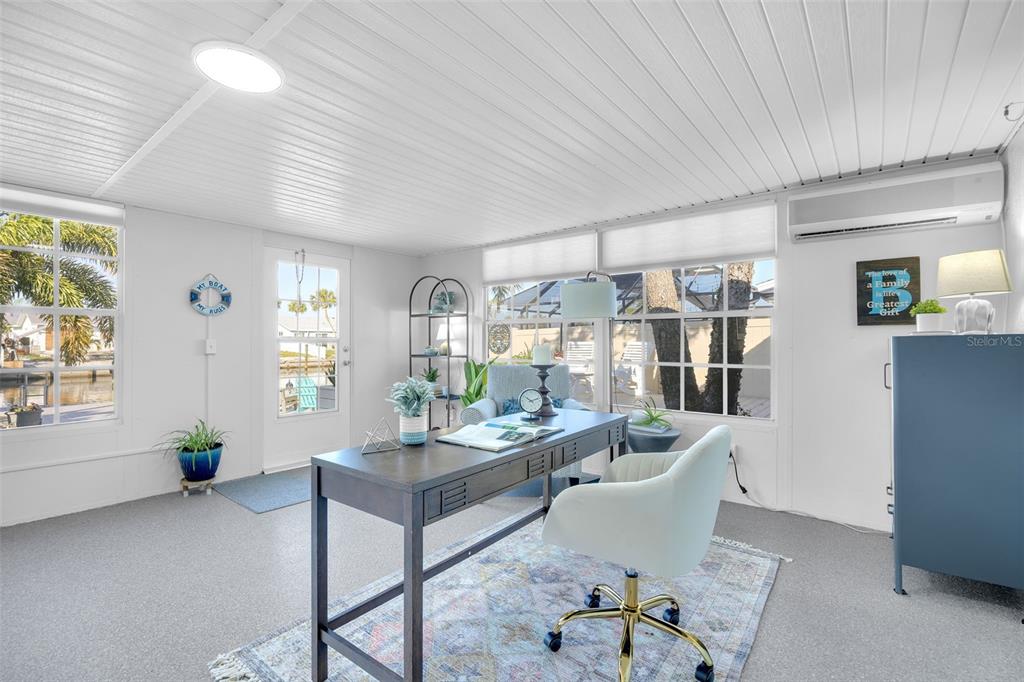 1015 Spindle Palm Way Apollo Beach, FL 33572 - Photo 37 of 78 a living room with furniture and window