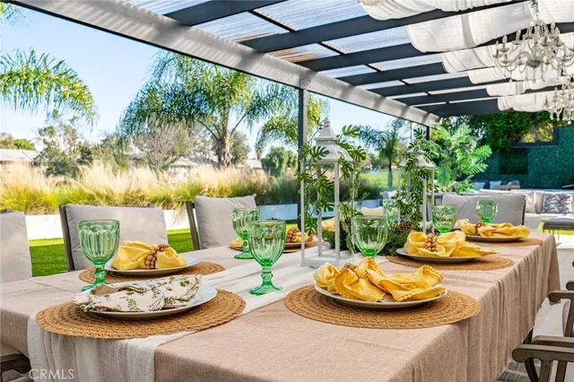 a table and chairs in a patio