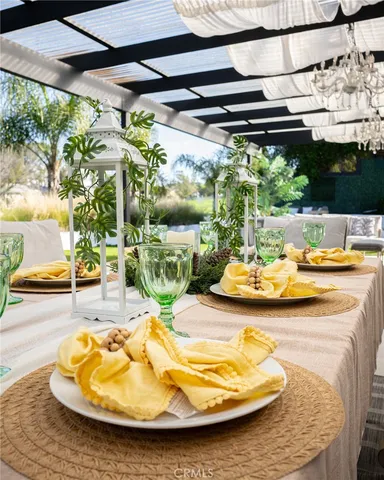 a view of a swimming pool with a patio