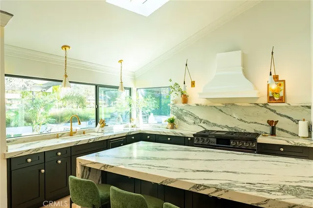 a kitchen with a sink and a window