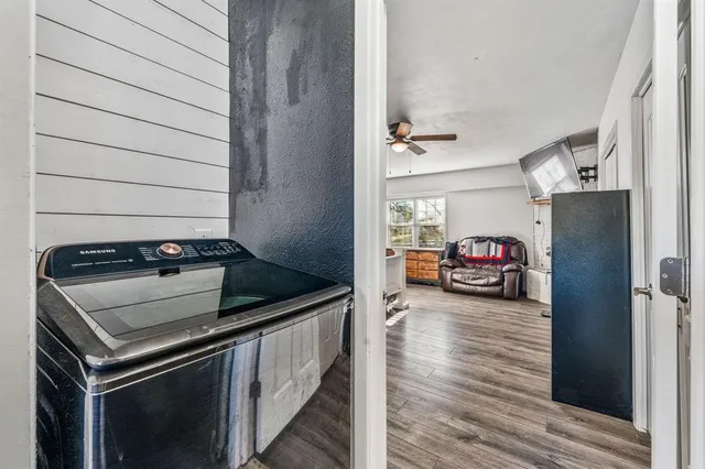 a kitchen with a stove and a refrigerator