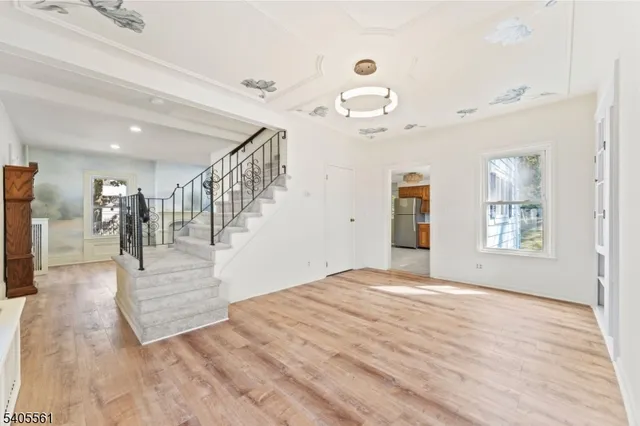 a view of a hallway view with staircase