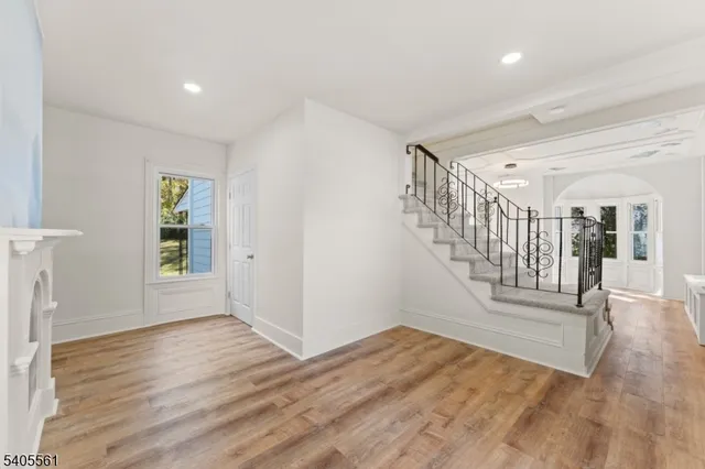 a view of entryway with wooden floor