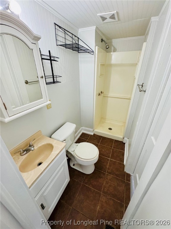 411 Carthage Road Lumberton, NC 28358 - Photo 22 of 25 a bathroom with a sink a toilet and shower
