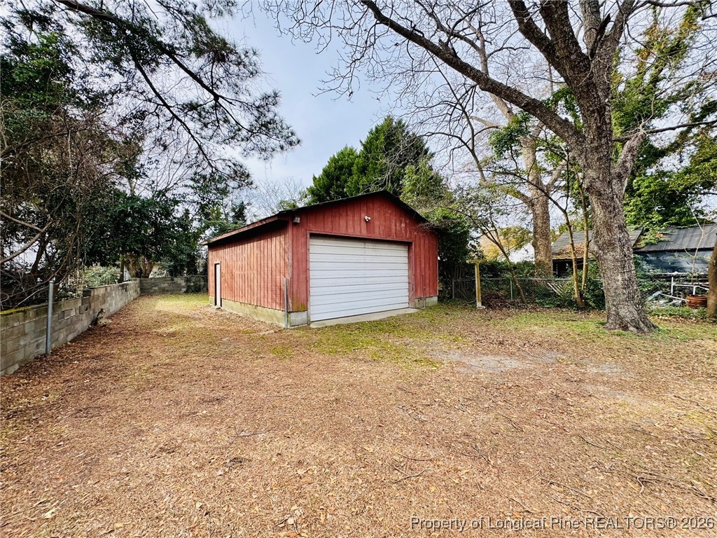 411 Carthage Road Lumberton, NC 28358 - Photo 4 of 25 a house with trees in front of it