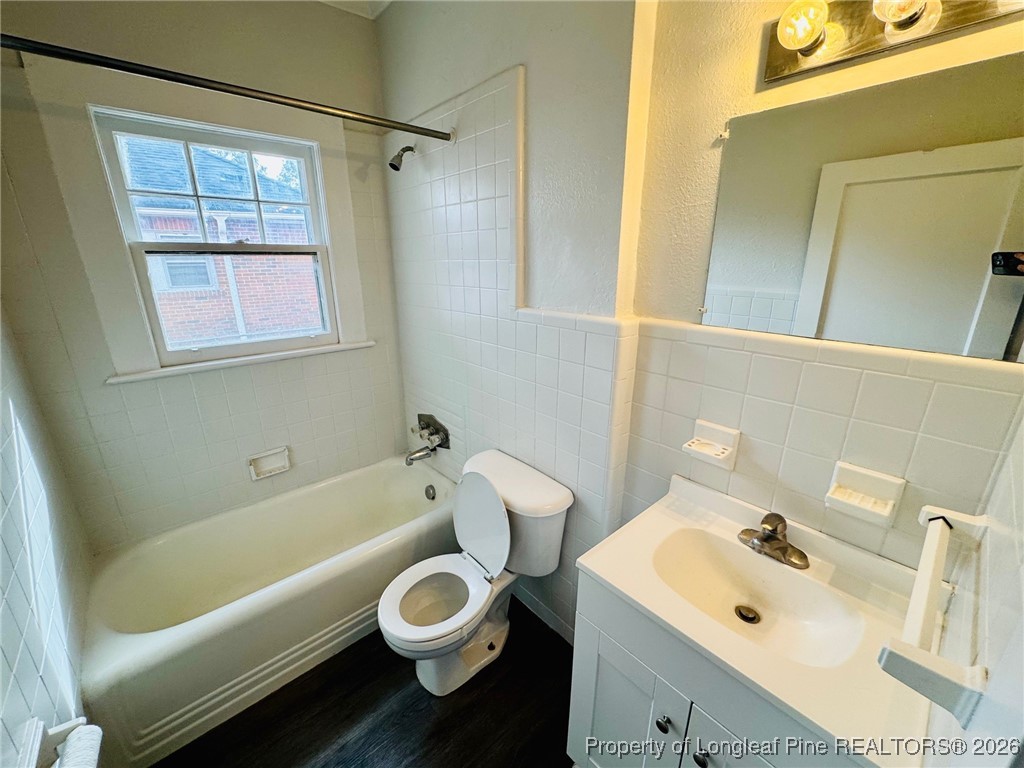 411 Carthage Road Lumberton, NC 28358 - Photo 10 of 25 a bathroom with a sink and a bathtub