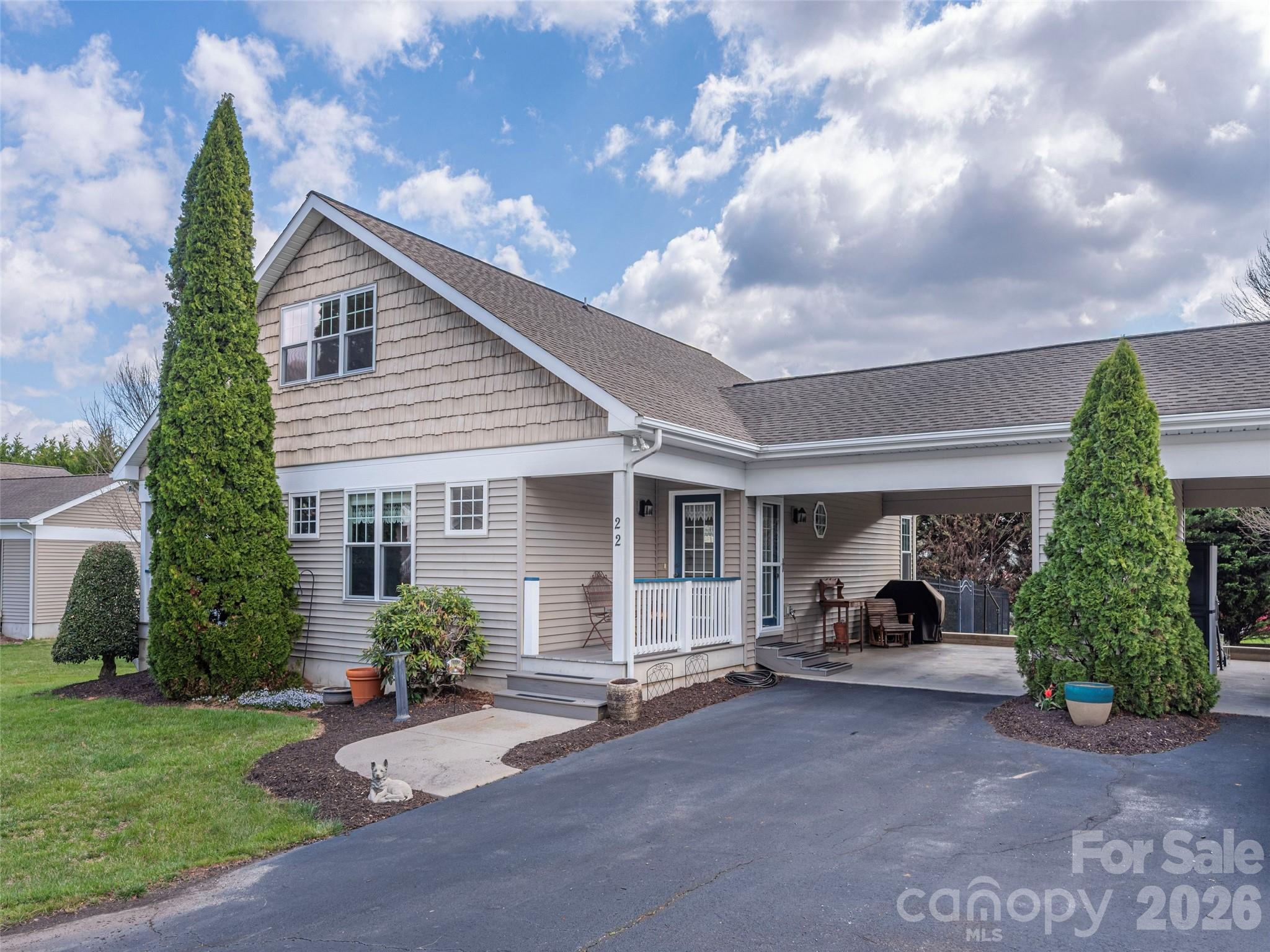 22 Cottage Loop Waynesville, NC 28785 - Photo 1 of 26 a view of a house with backyard and garden