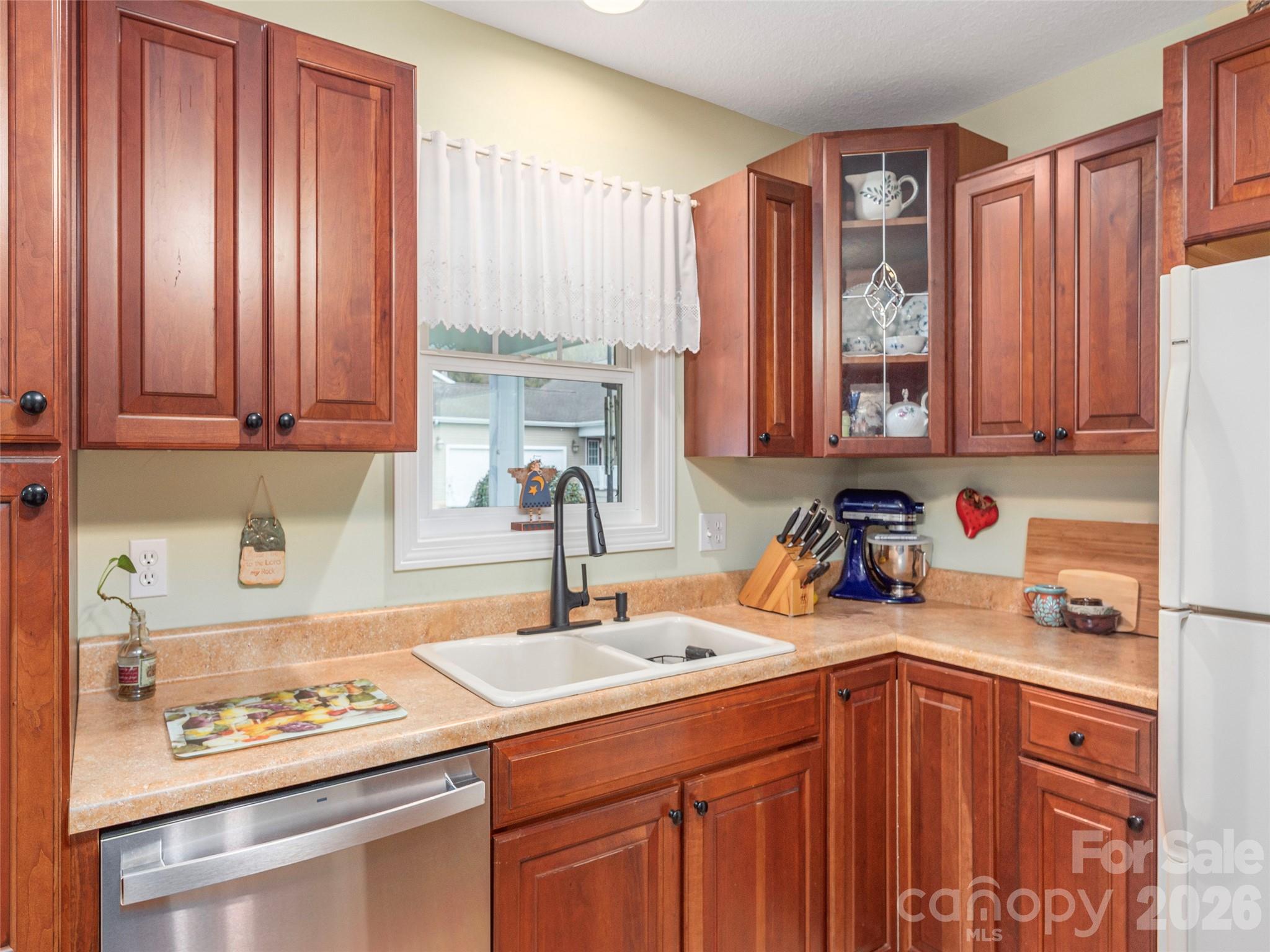 22 Cottage Loop Waynesville, NC 28785 - Photo 12 of 26 a kitchen with a sink cabinets and appliances