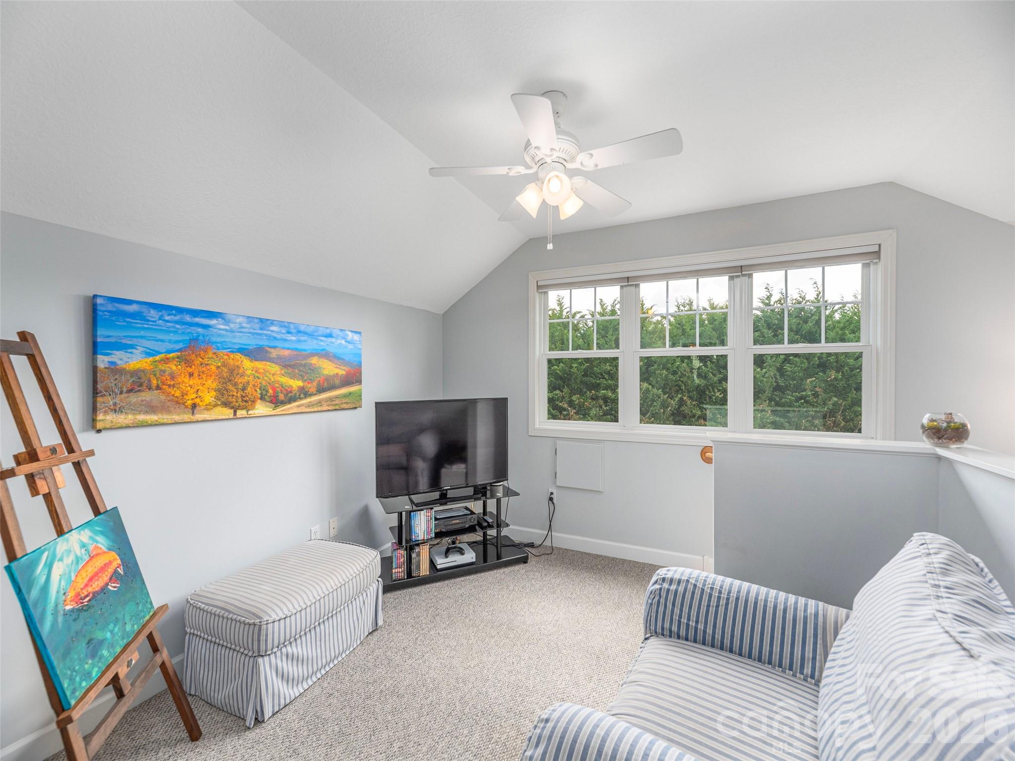 22 Cottage Loop Waynesville, NC 28785 - Photo 20 of 26 a bedroom with a bed and a window