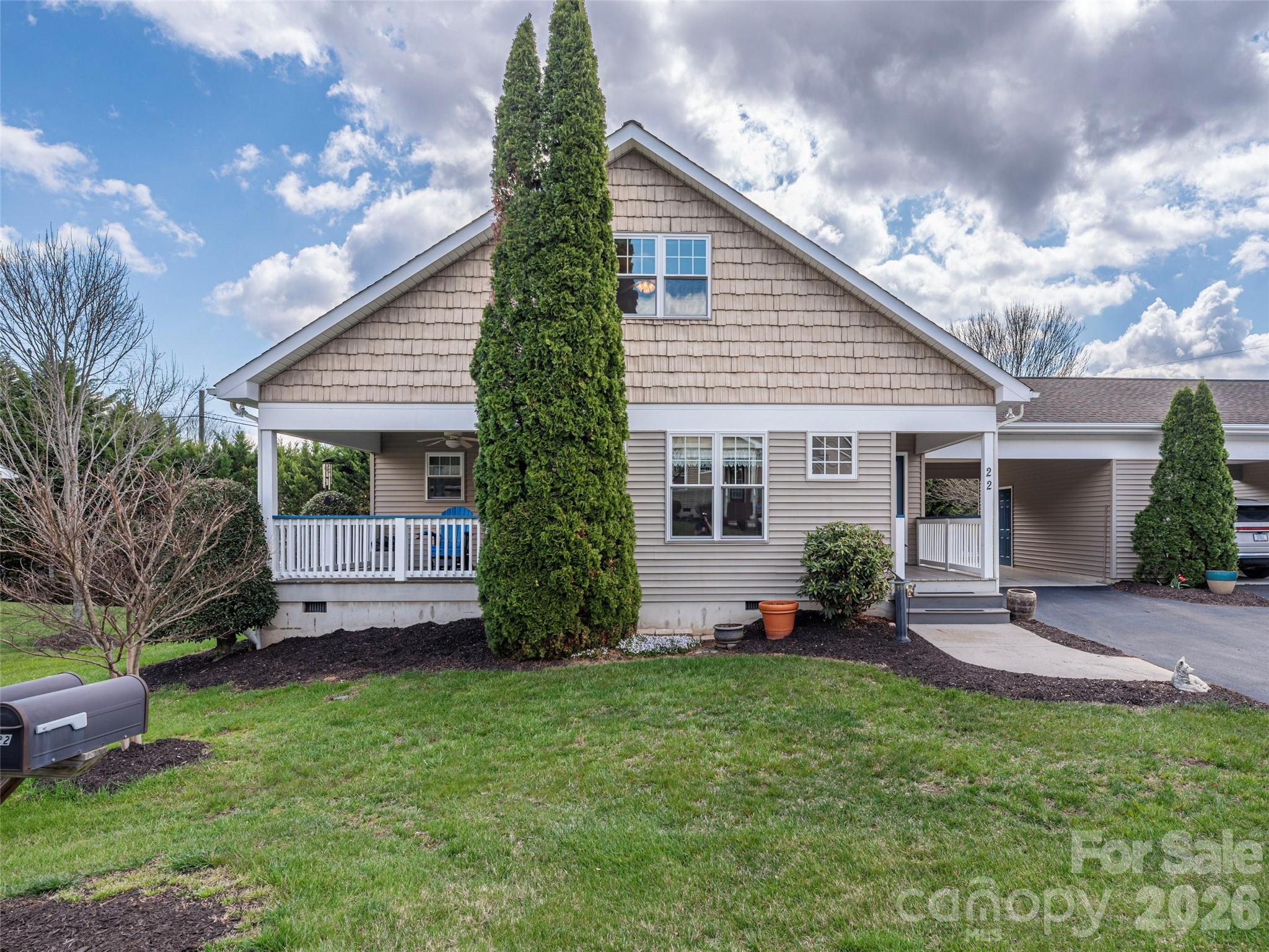 22 Cottage Loop Waynesville, NC 28785 - Photo 2 of 26 a view of a house with a yard and plants