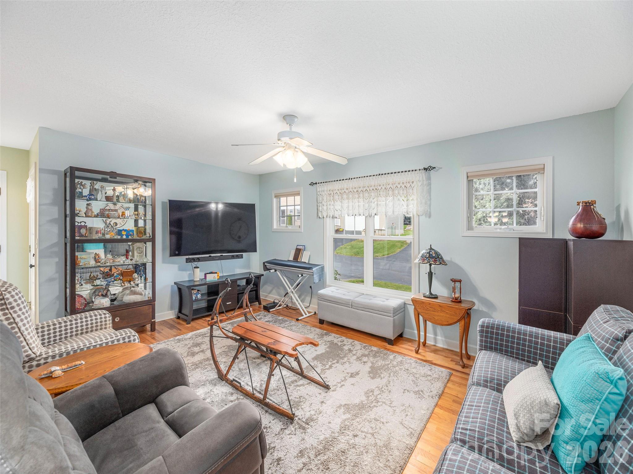 22 Cottage Loop Waynesville, NC 28785 - Photo 5 of 26 a living room with furniture and a flat screen tv