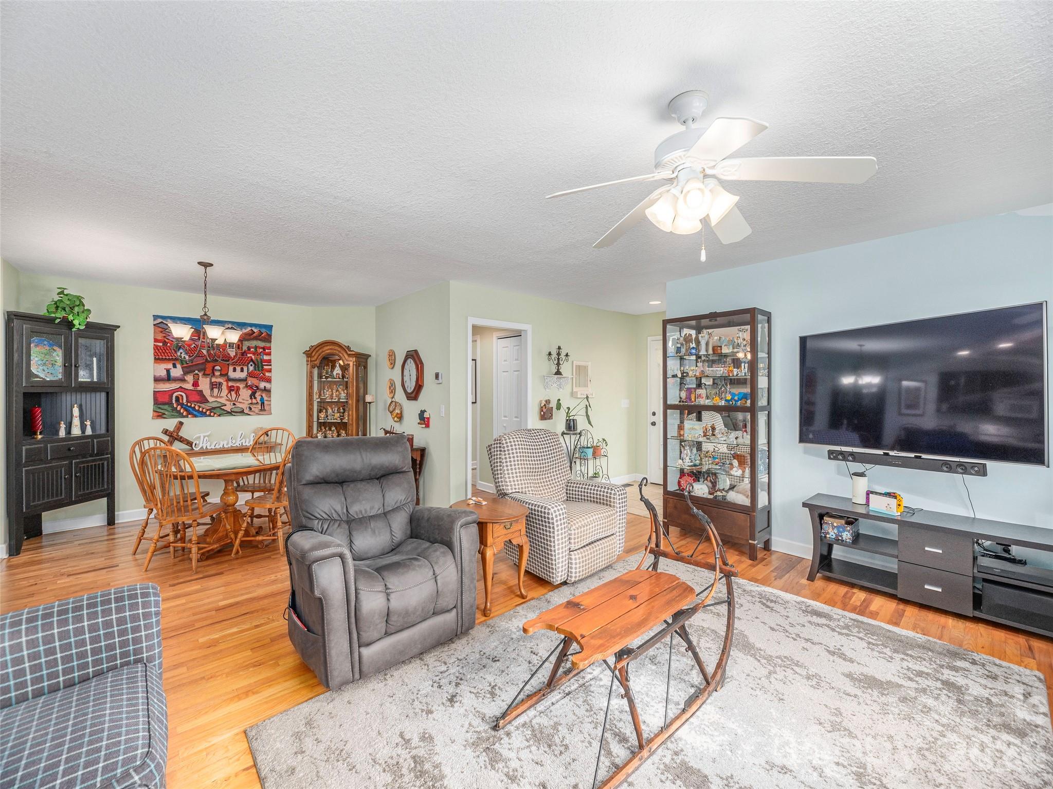22 Cottage Loop Waynesville, NC 28785 - Photo 6 of 26 a living room with furniture and a flat screen tv