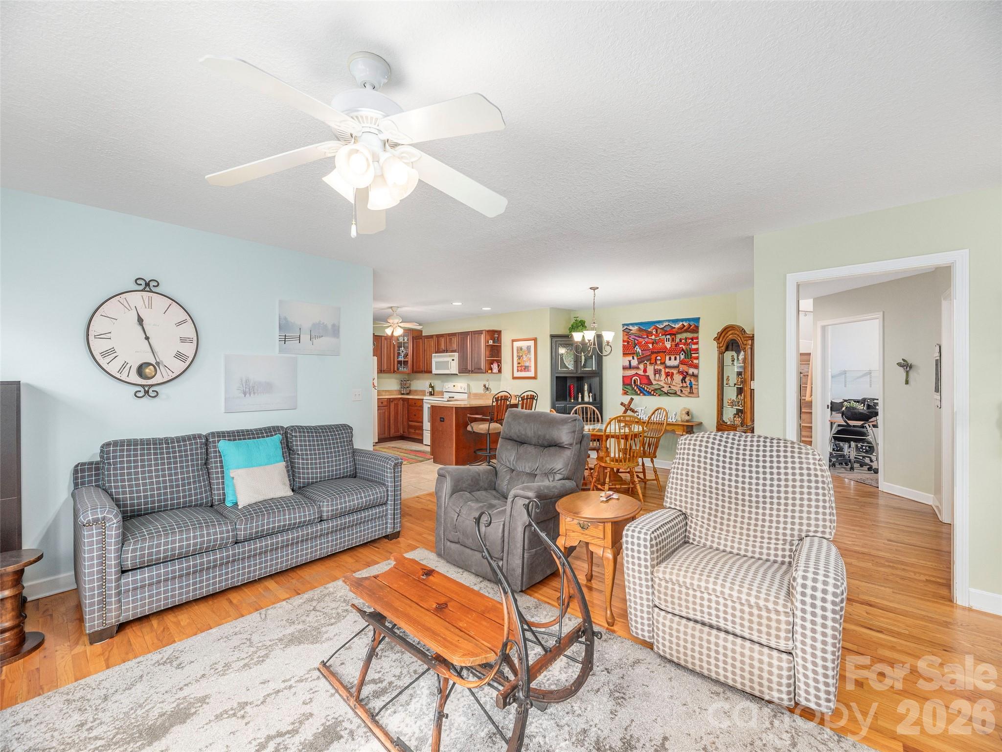 22 Cottage Loop Waynesville, NC 28785 - Photo 7 of 26 a living room with furniture a rug and white walls
