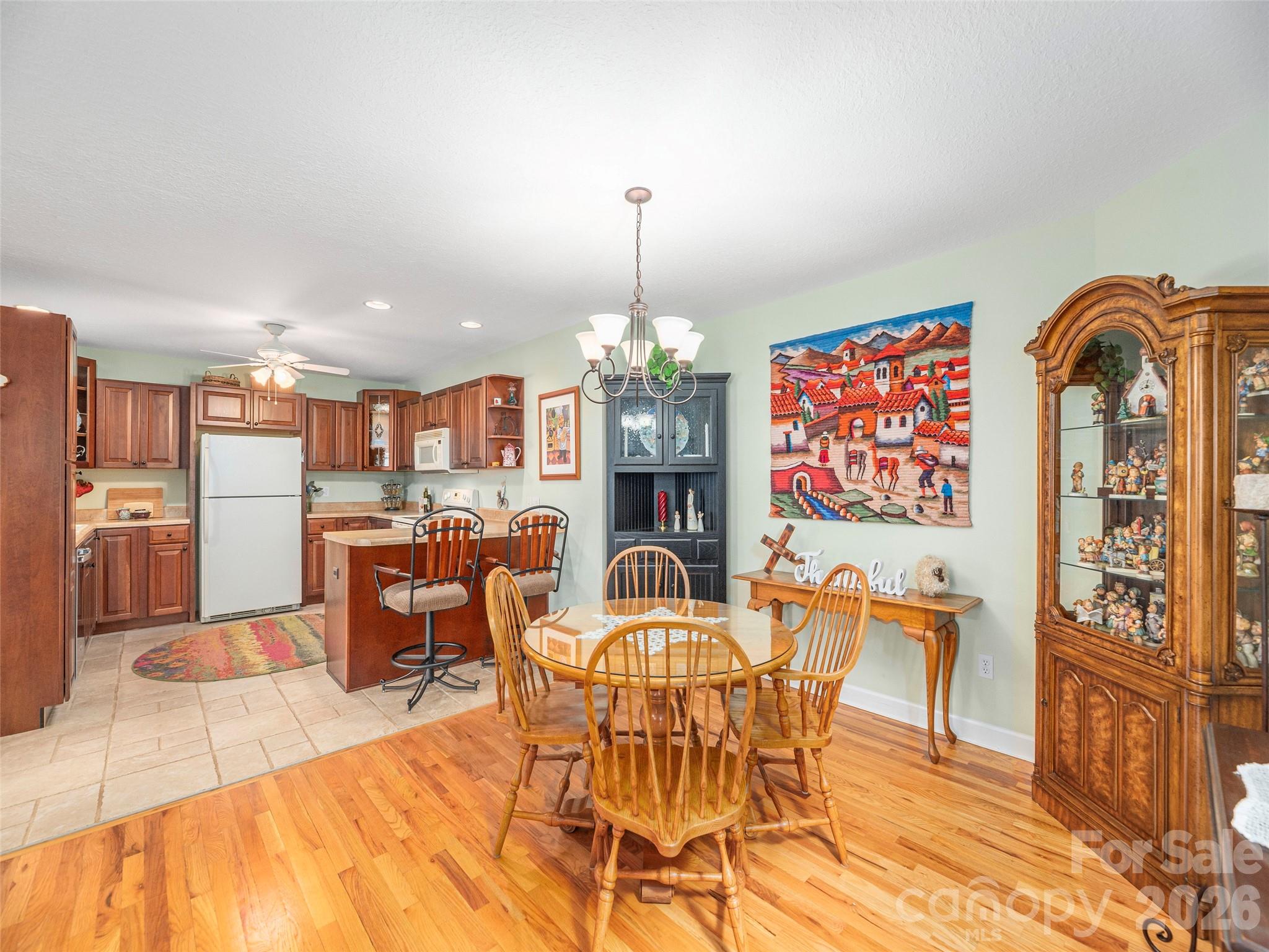 22 Cottage Loop Waynesville, NC 28785 - Photo 9 of 26 a dining room with furniture and chandelier