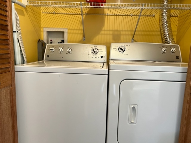 1526 McClure Road, Unit 1526 Aurora, IL 60505 - Photo 11 of 12 a utility room with dryer and washer