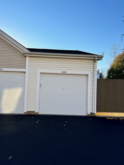 1526 McClure Road, Unit 1526 Aurora, IL 60505 - Photo 12 of 12 a side view of house with backyard