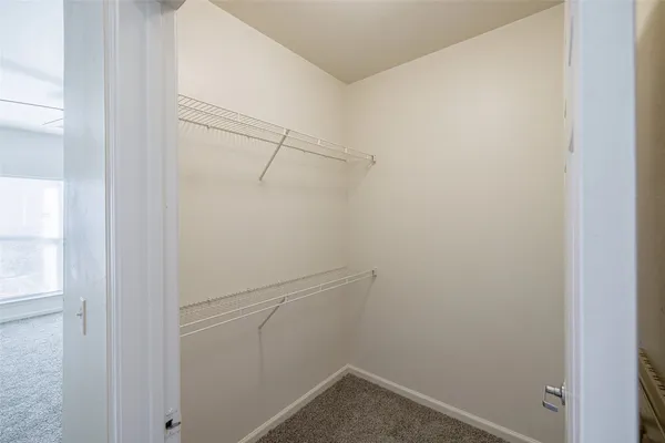 a view of a room with racks on the wall