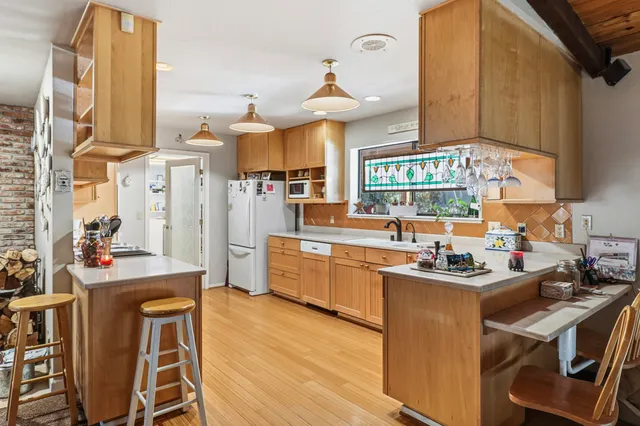 a bathroom with a sink double vanity and shower