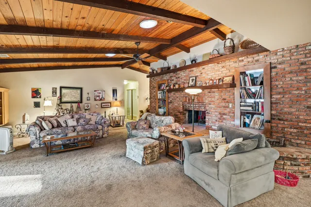 a bed room with a bed and a television