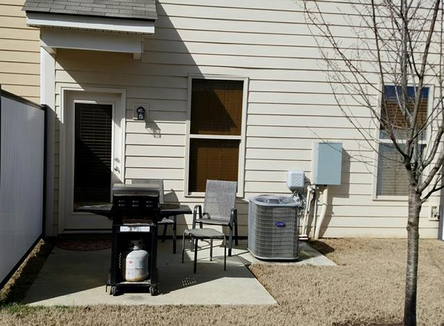 806 Brigade Loop Murfreesboro, TN 37128 - Photo 19 of 21 PRIVATE BACK PATIO WITH DIVIDERS. THIS UNIT HAS NO WINDOWS LOOKING INTO THIS TOWNHOME.