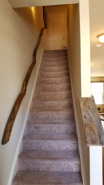 806 Brigade Loop Murfreesboro, TN 37128 - Photo 8 of 21 NOTICE THE RUSTIC WOOD BEAM HANDRAIL THAT WAS DESIGNED AND CRAFTED OUT OF REAL WOOD. GORGEOUS PIECE.