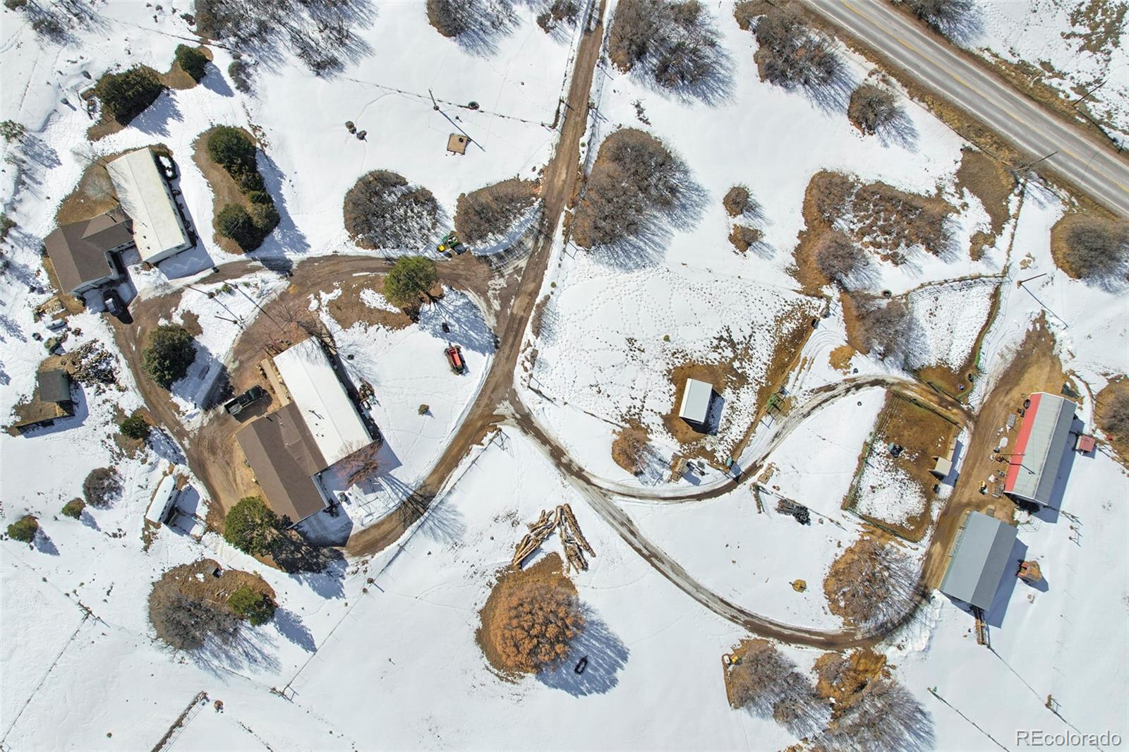 1382 Flintwood Road Franktown, CO 80116 - Photo 3 of 40 an aerial view of a house with garden