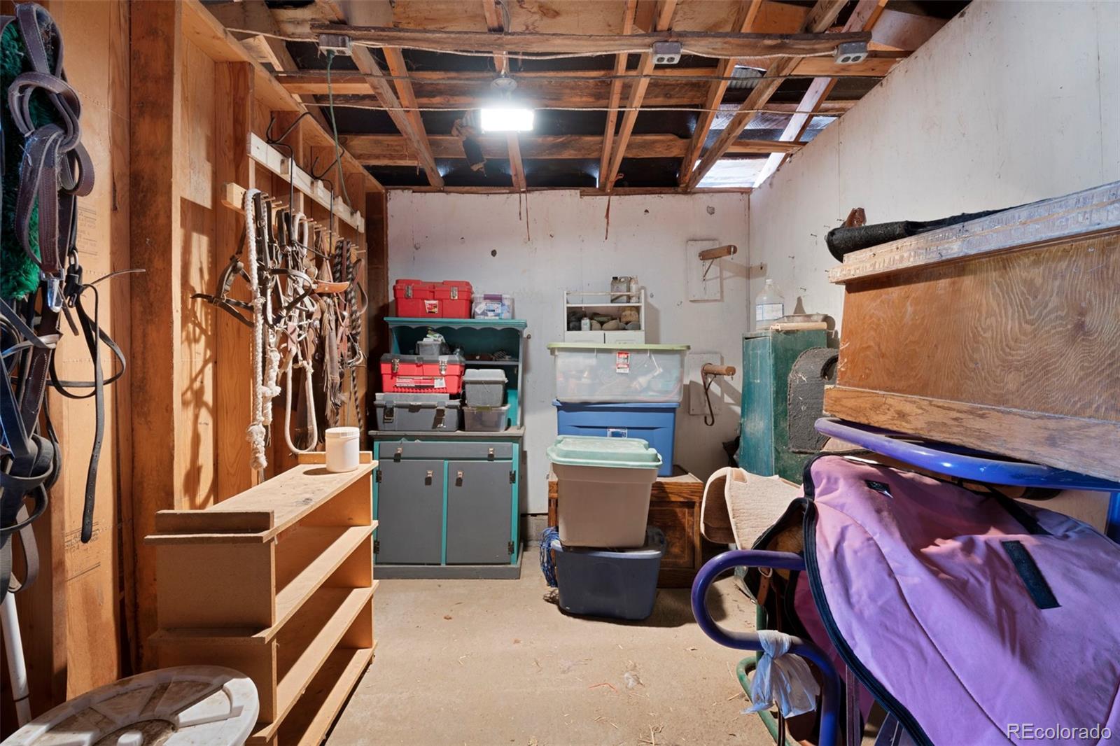 1382 Flintwood Road Franktown, CO 80116 - Photo 36 of 40 a room with storage and utility