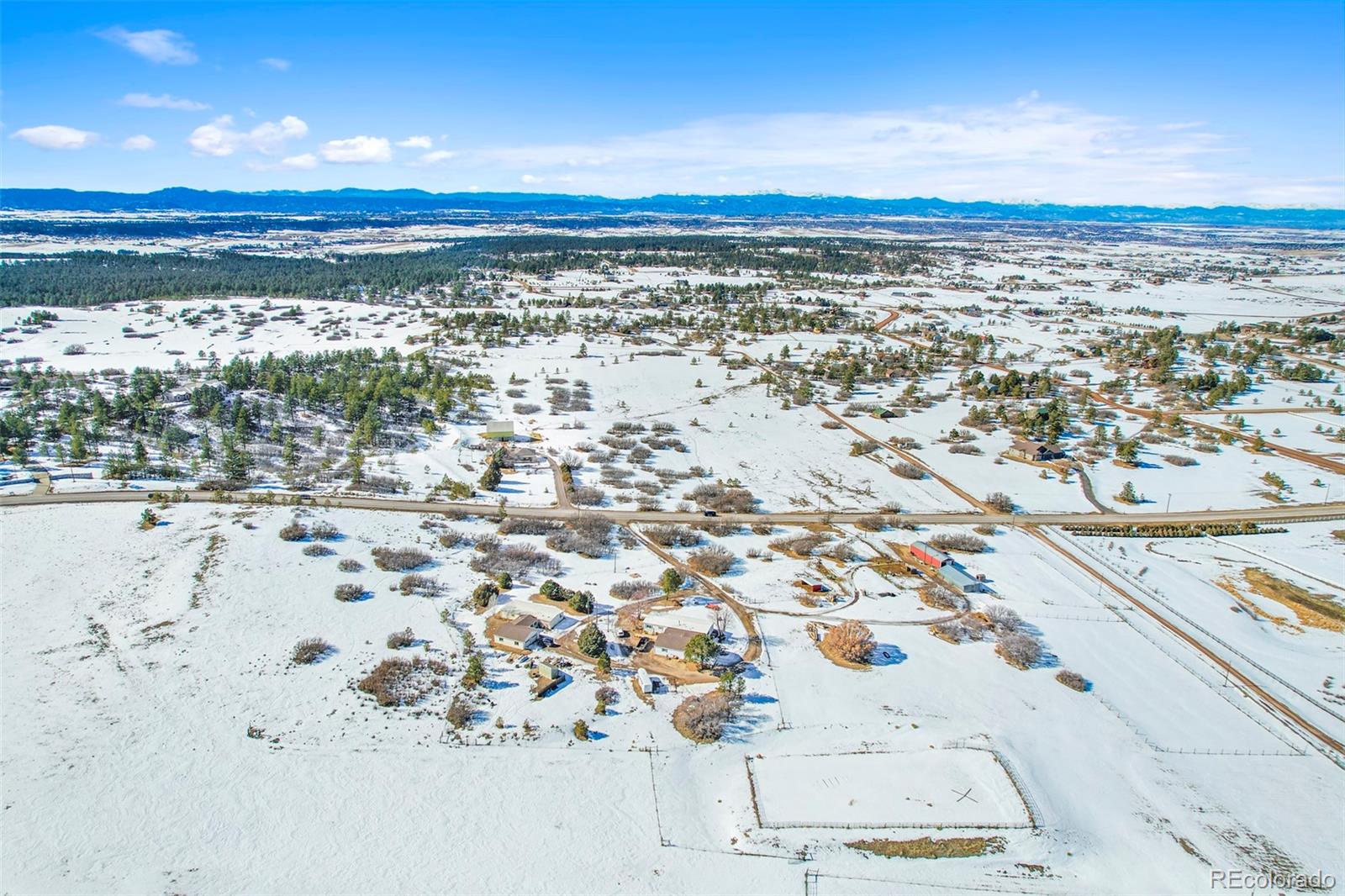 1382 Flintwood Road Franktown, CO 80116 - Photo 6 of 40 a view of city and ocean
