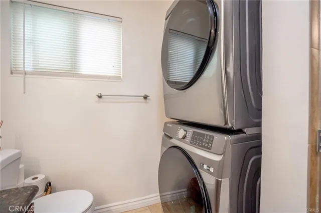 a close view of a utility room with washer and dryer