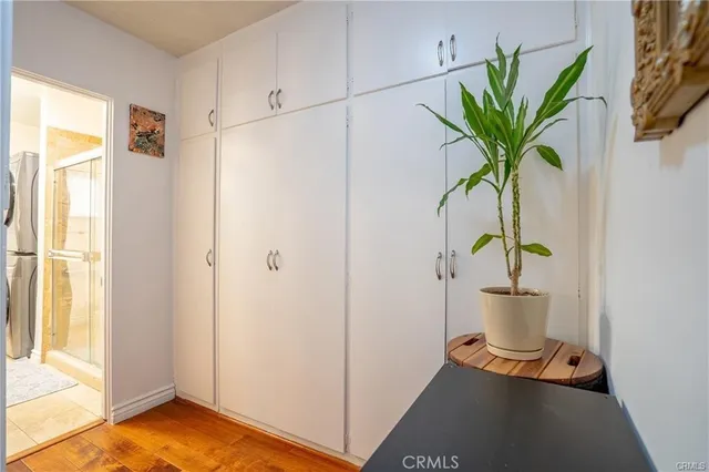 a view of entryway with wooden floor