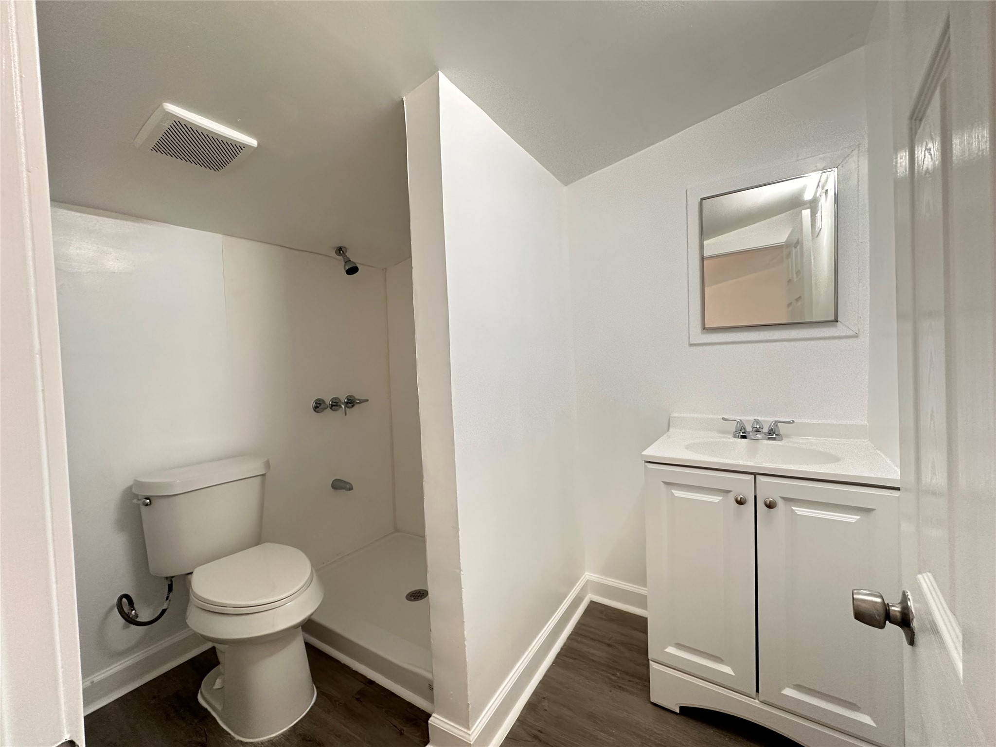 2516 Ivy Street Houston, TX 77026 - Photo 7 of 9 a bathroom with a toilet a sink and a shower