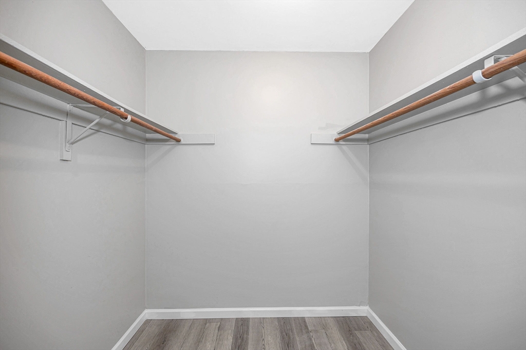 1241 Lawrence Street, Unit 101 Lowell, MA 01852 - Photo 17 of 27 a view of a room with shelf