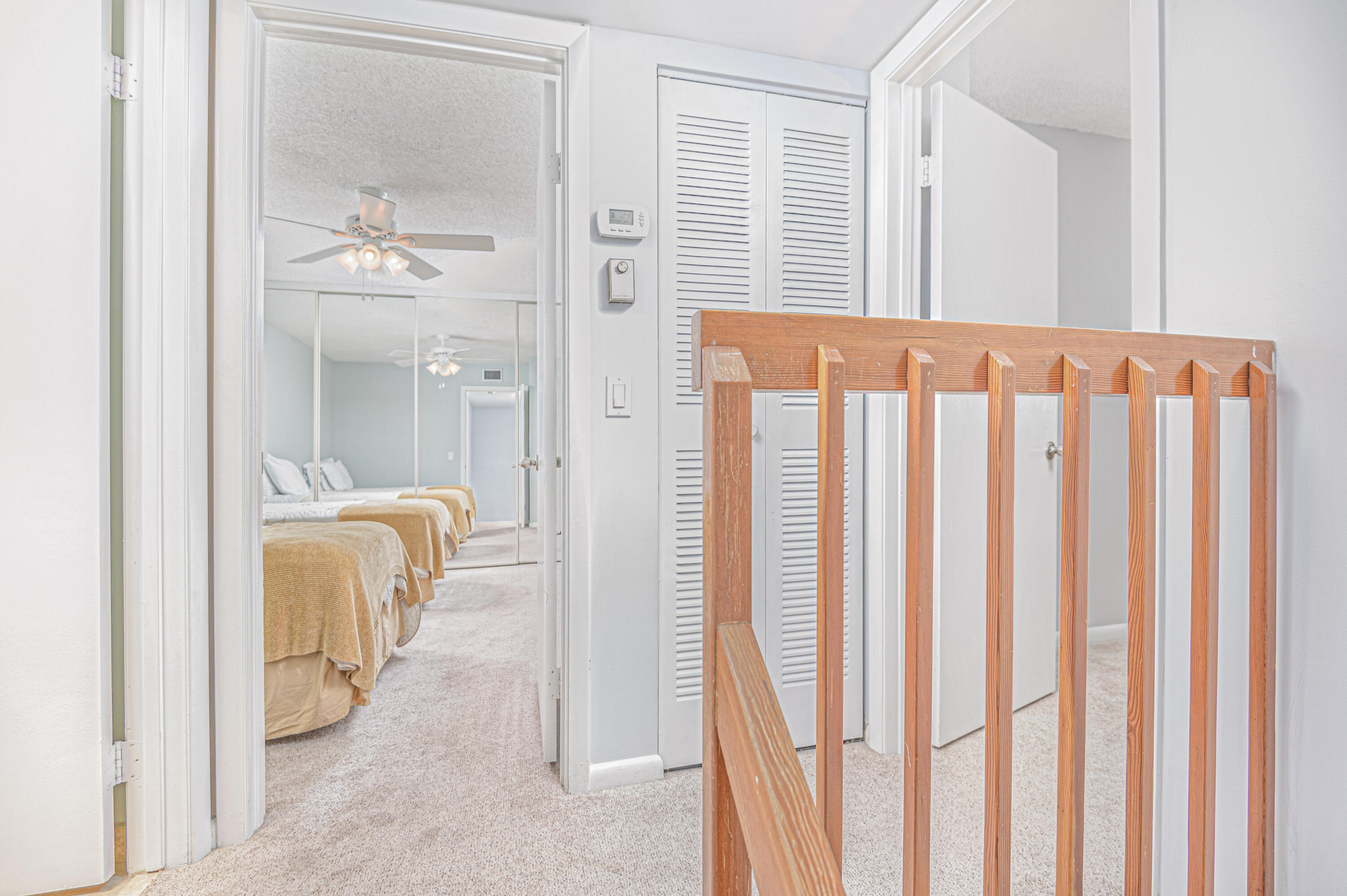 2980 Southwest Sunset Trace Circle Palm City, FL 34990 - Photo 12 of 21 a view of a bathroom from a hallway