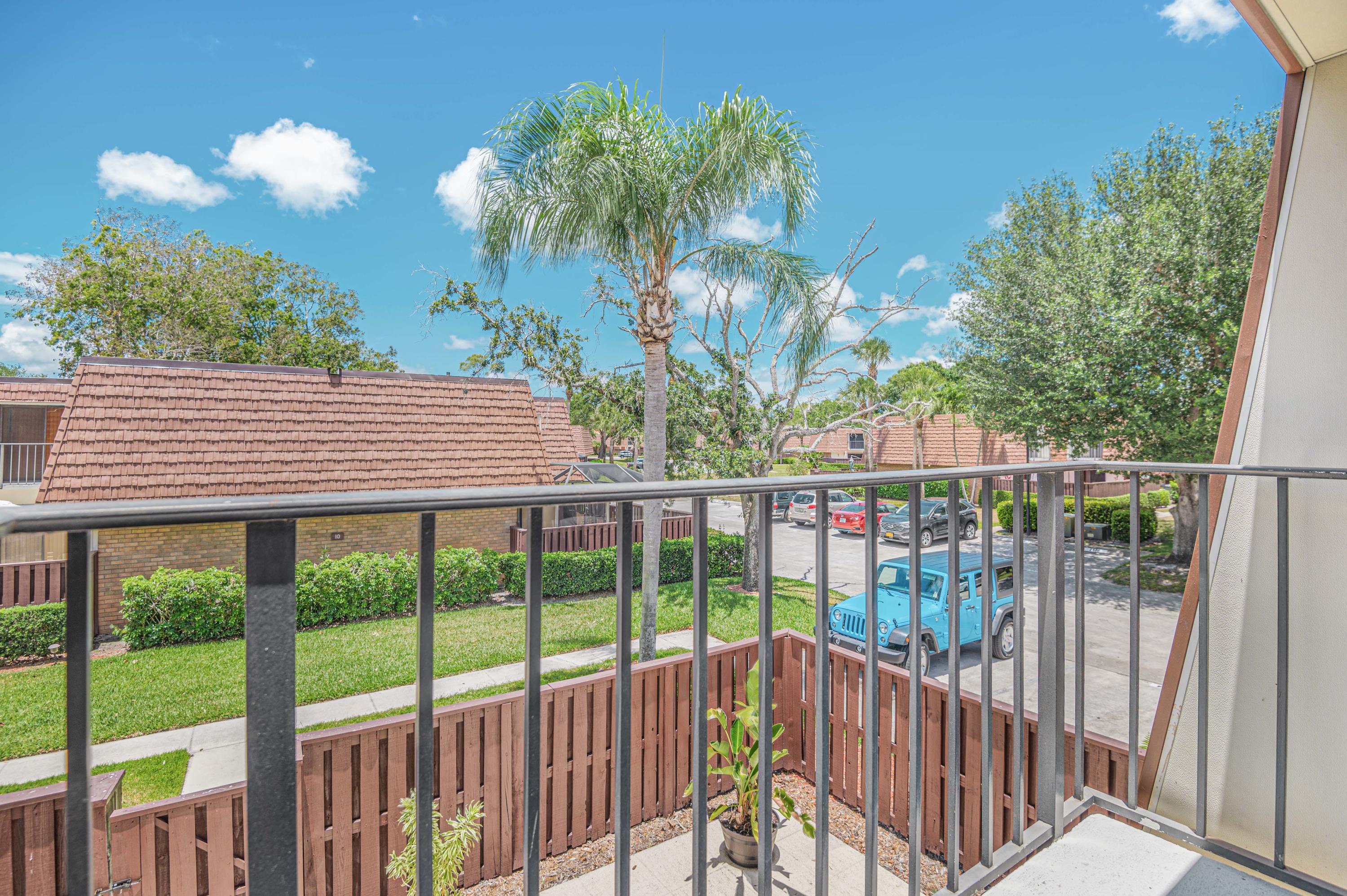 2980 Southwest Sunset Trace Circle Palm City, FL 34990 - Photo 17 of 21 a view of a balcony
