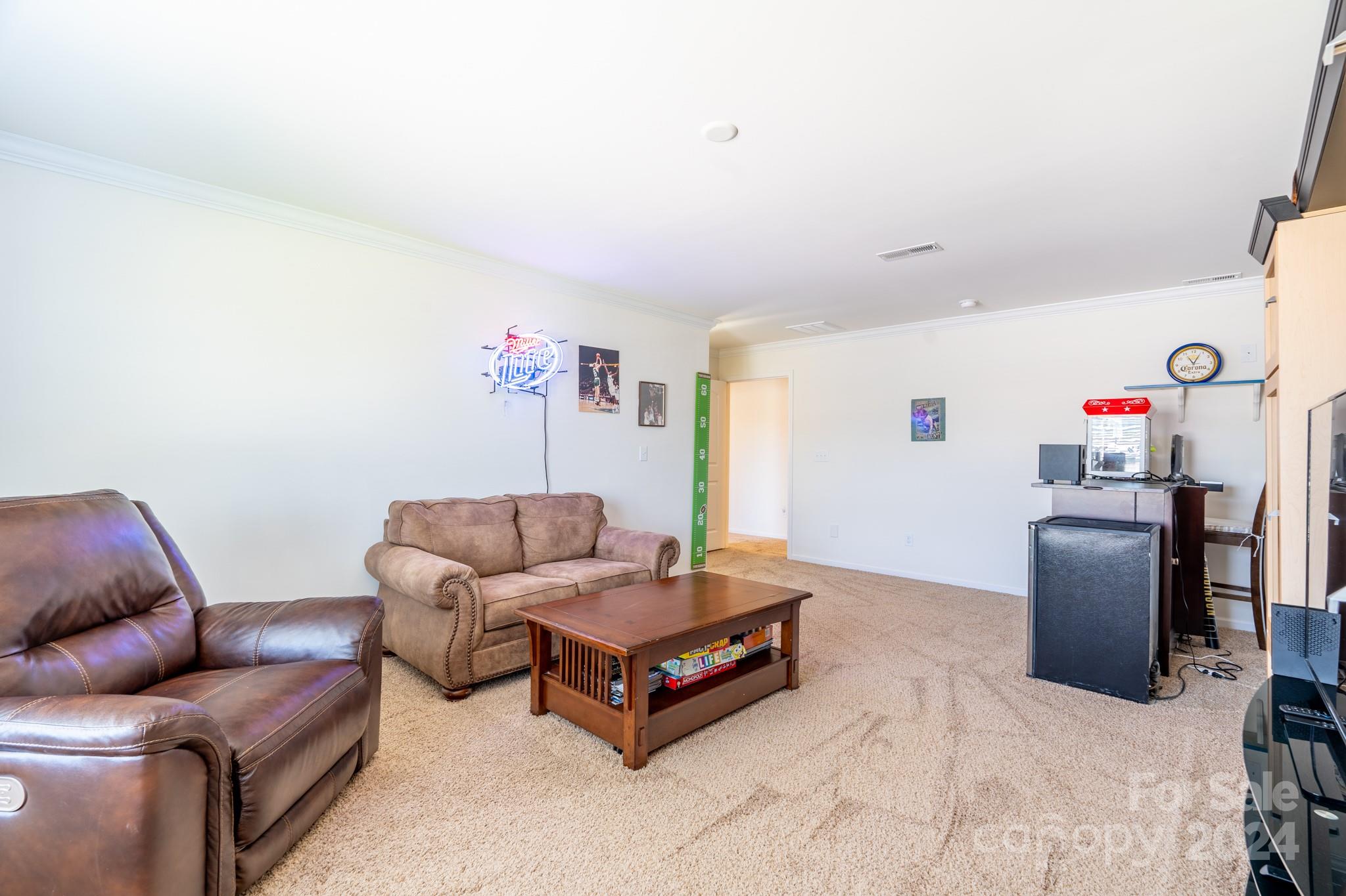 5396 Hackberry Lane Southwest Concord, NC 28027 - Photo 29 of 31 a living room with furniture and a couch