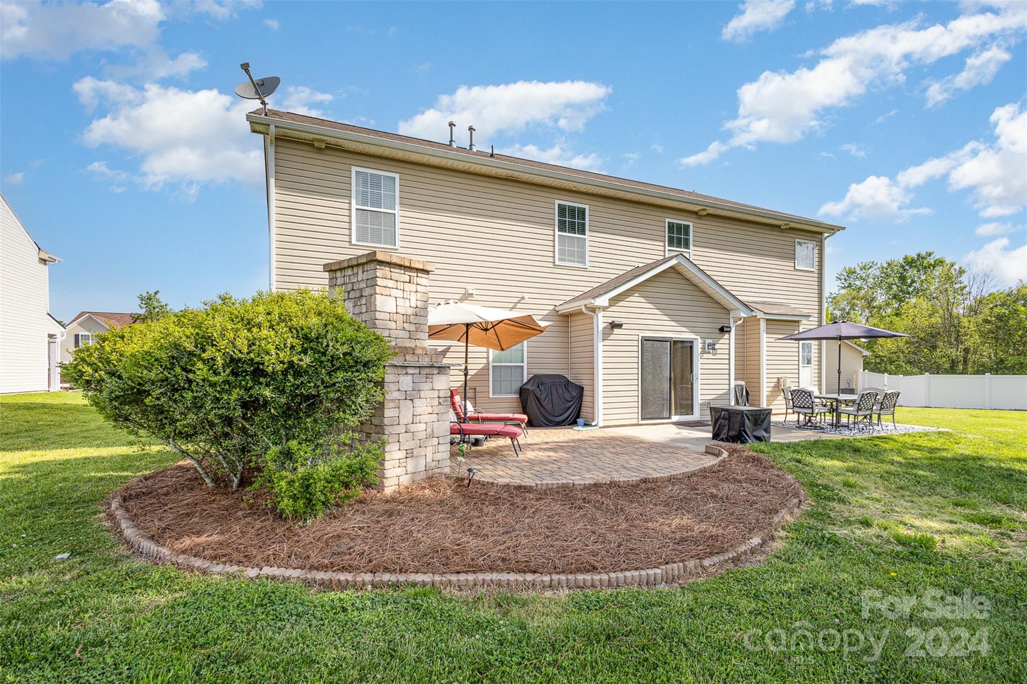 5396 Hackberry Lane Southwest Concord, NC 28027 - Photo 5 of 31 a front view of a house with a yard