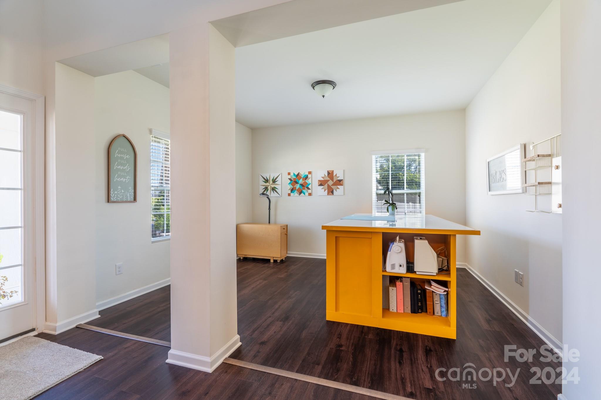 5396 Hackberry Lane Southwest Concord, NC 28027 - Photo 8 of 31 a living room with furniture and wooden floor