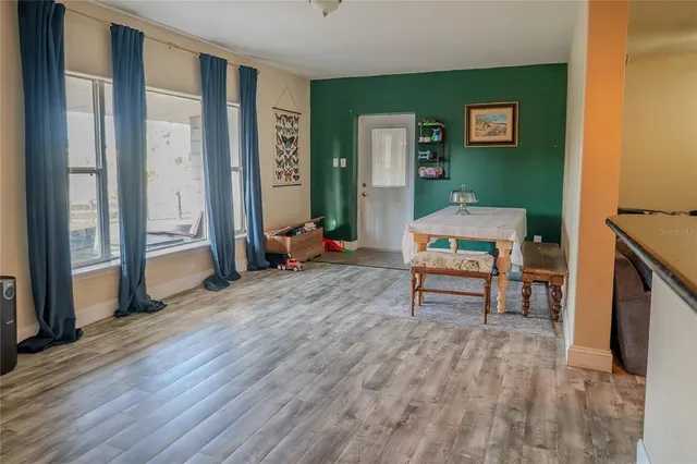 a bedroom with a bed and a table