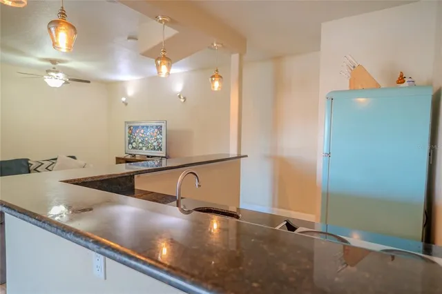 a bedroom with a bed and a table