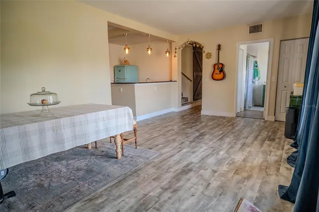 a outdoor living space with furniture and a potted plant