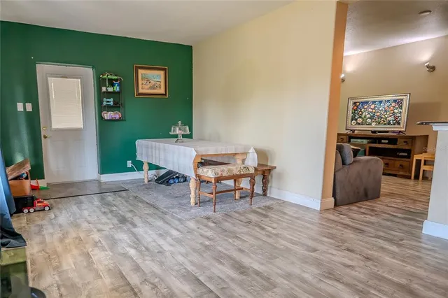 a outdoor living space with furniture and a potted plant