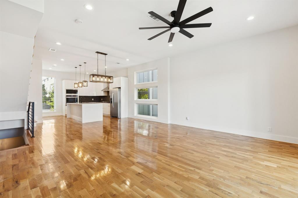4119 Munger Avenue Dallas, TX 75204 - Photo 3 of 30 a view of kitchen with furniture and wooden floor
