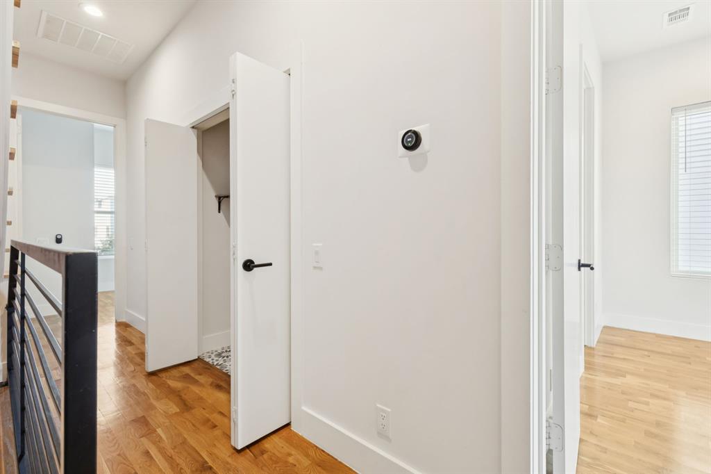 4119 Munger Avenue Dallas, TX 75204 - Photo 8 of 30 a view of a hallway with a door and closet