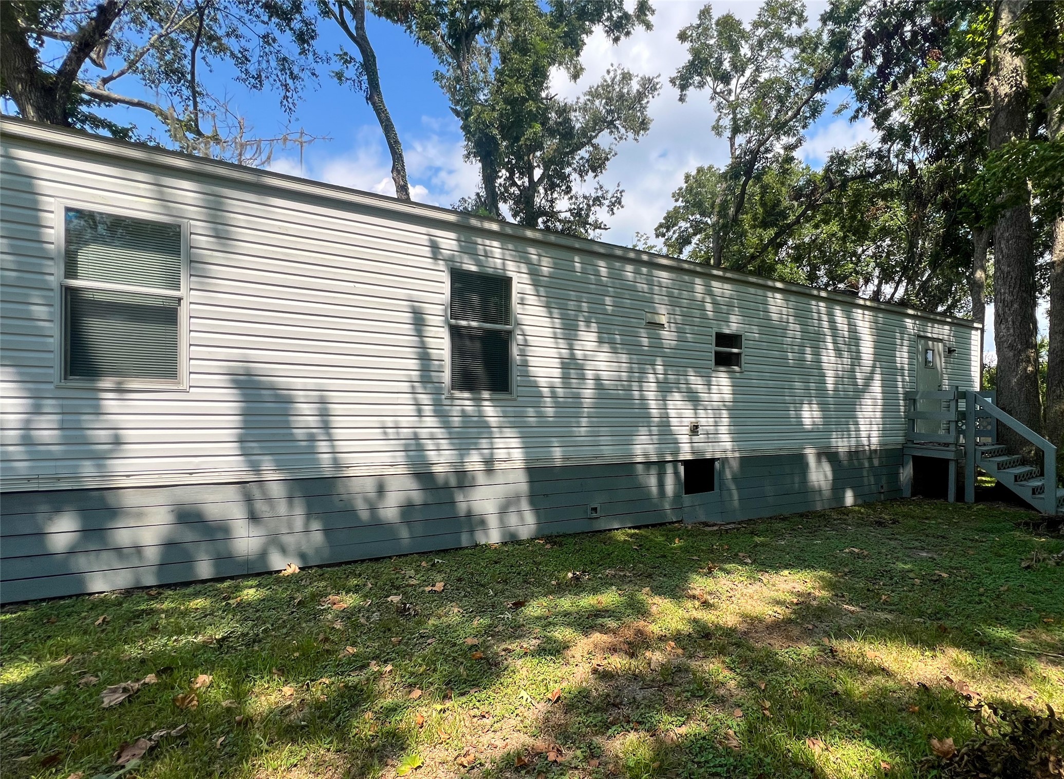 149 Devils Road Goodrich, TX 77335 - Photo 15 of 15 a view of a back yard of the house