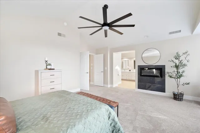 a bathroom with a shower and a sink
