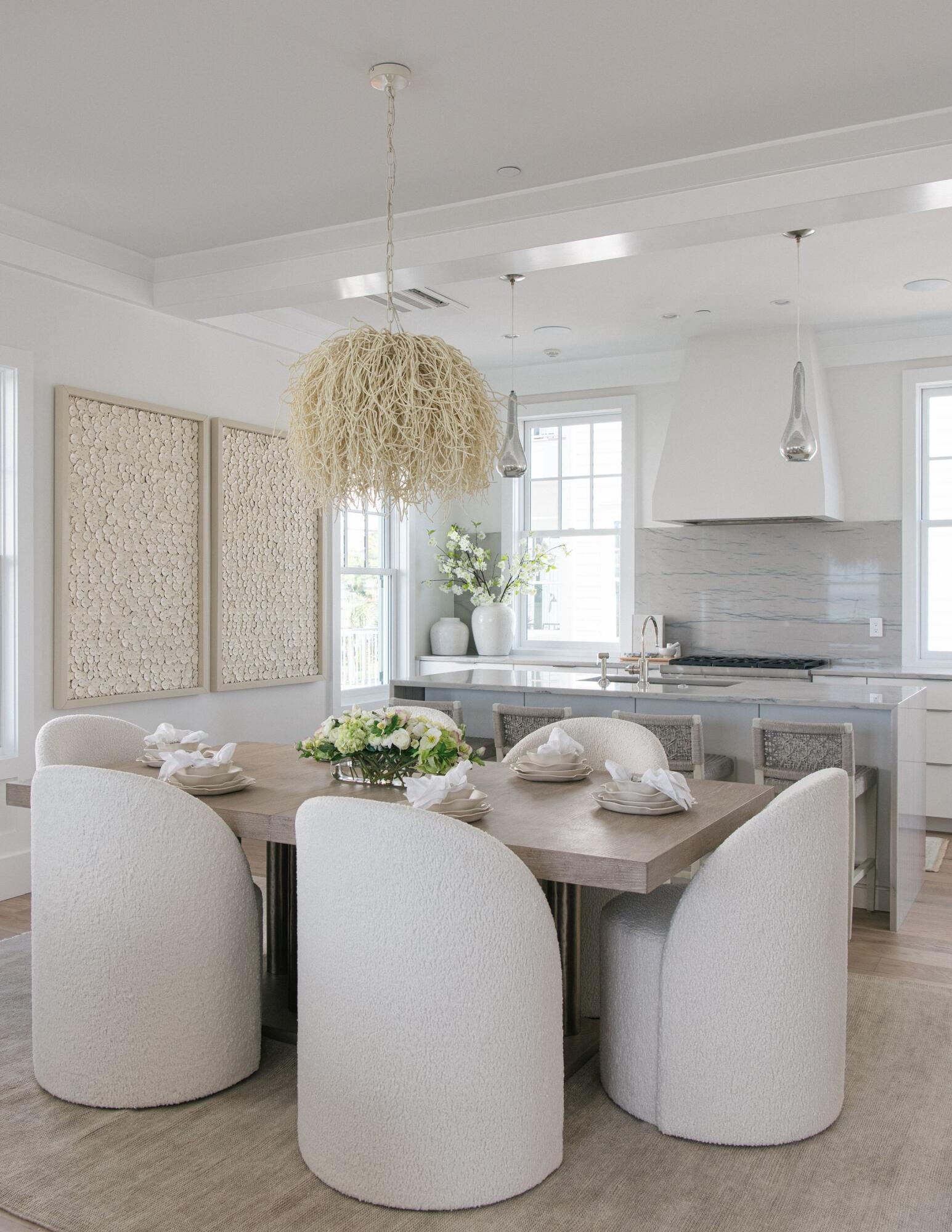 Lot 1 Lupin Beach Dr Inlet Beach Inlet Beach, FL 32461 - Photo 7 of 23 a kitchen with stainless steel appliances granite countertop a sink a stove a dining table and chairs