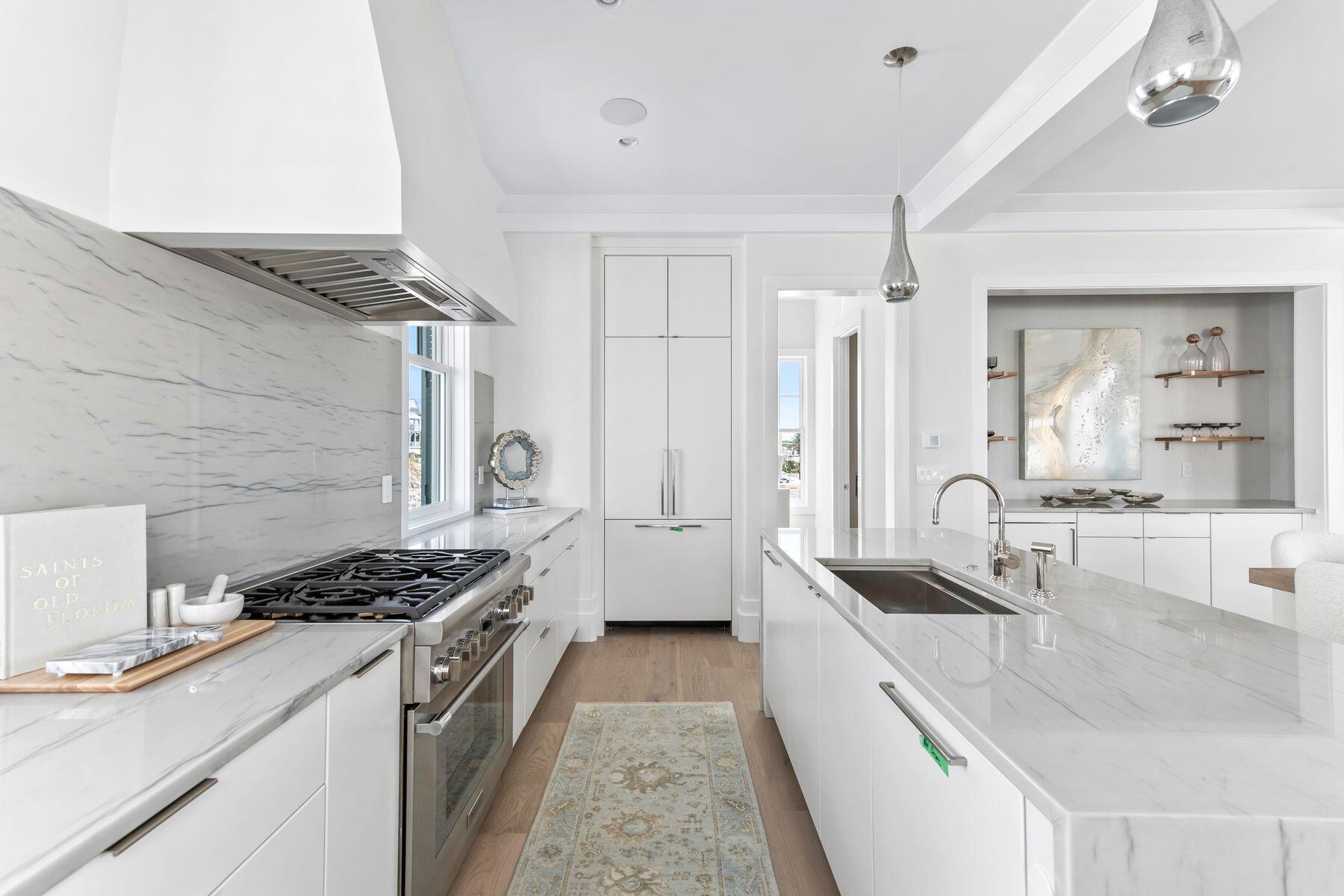 Lot 1 Lupin Beach Dr Inlet Beach Inlet Beach, FL 32461 - Photo 10 of 23 a kitchen with granite countertop a sink stove and cabinets