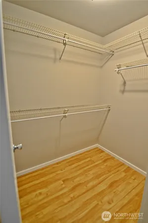 a view of a room with racks on the wall