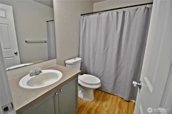 a bathroom with a sink and a toilet