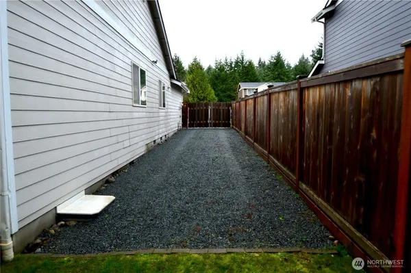 a view of a backyard with green space